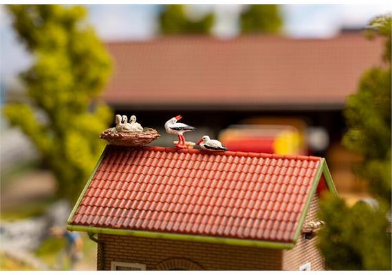 Faller 180239 Figuren-Set mit Mini-Sound-Effekt Störche - H0 (1:87) | Bild 1
