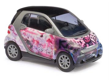 Busch Smart Fortwo 07 Puzzle "Pink skull" (BJ 2007) HO