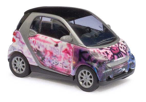 Busch Smart Fortwo 07 Puzzle "Pink skull" (BJ 2007) HO