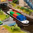 Faller 131013 Flussfrachter mit Containern - H0 (1:87) | Bild 1