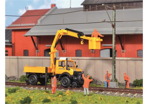 Kibri 14991 Zweiwege UNIMOG GleisBau mit Arbeitskran und Korb, H0 (1:87) | Bild 1
